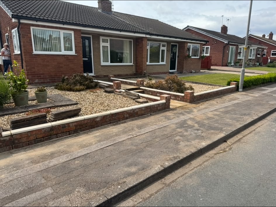 Wide view of front garden wall, edging and steps